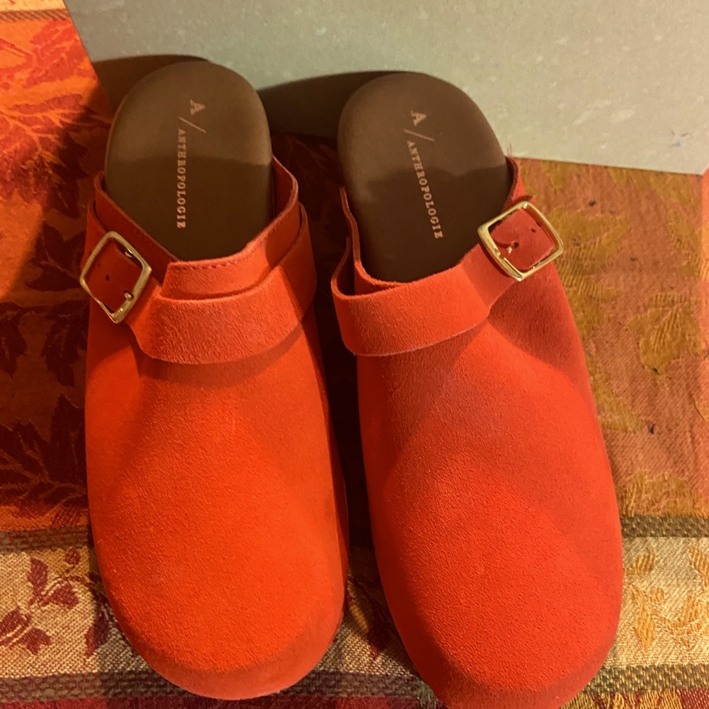 Perfectly Posh! Orange-red Anthropologie clogs.